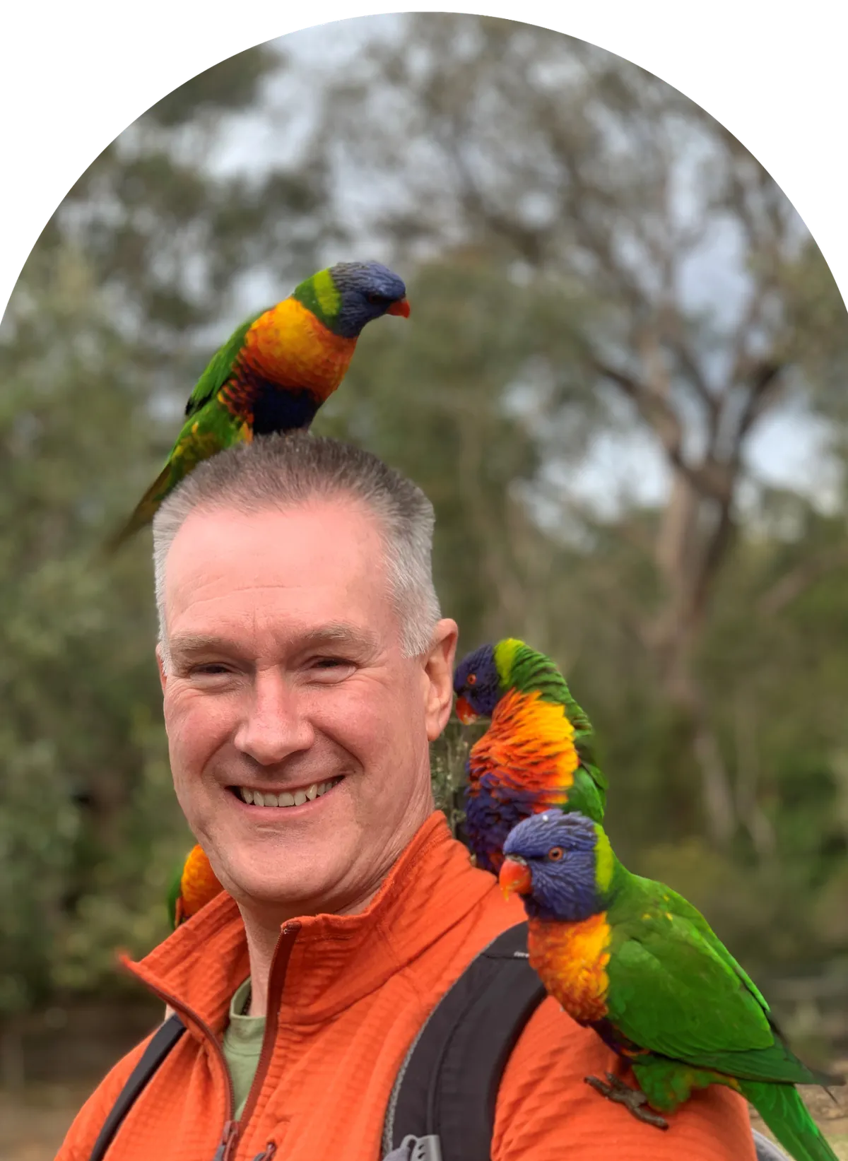 Dave Cullen with bird perched on his shoulder