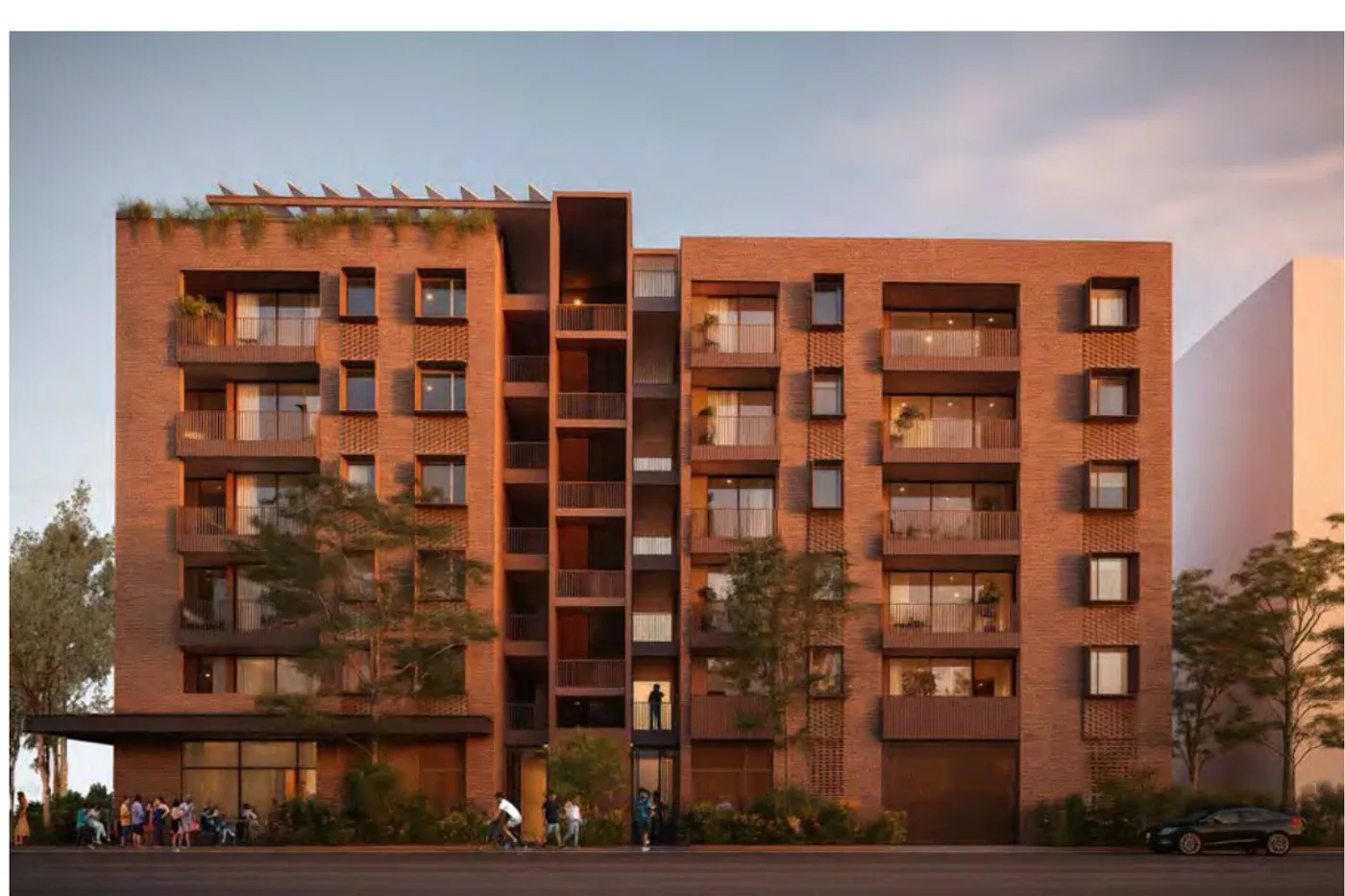 Street facade of Corner Lot Apartments 01 in the Earth material palette, in warm red and ochre brick