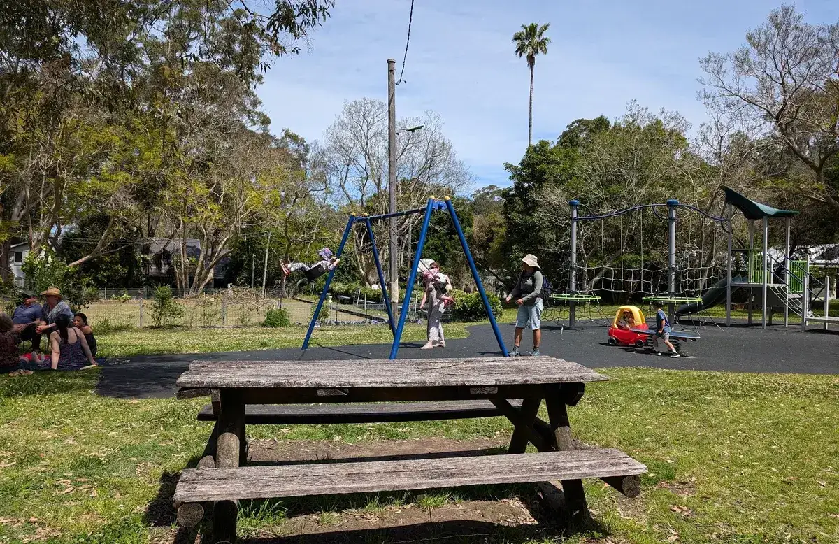 Playground with swings and a climbing frame on Dangar Island