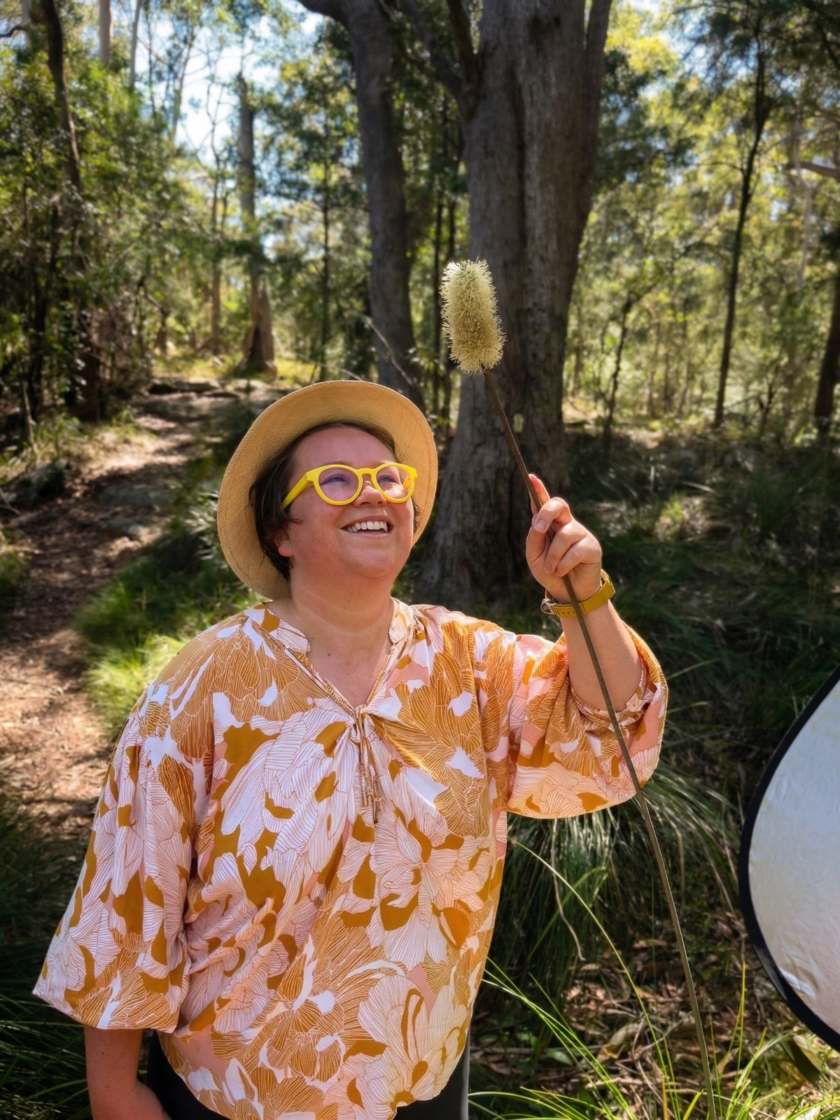 Shea Cullen with native wildflowers