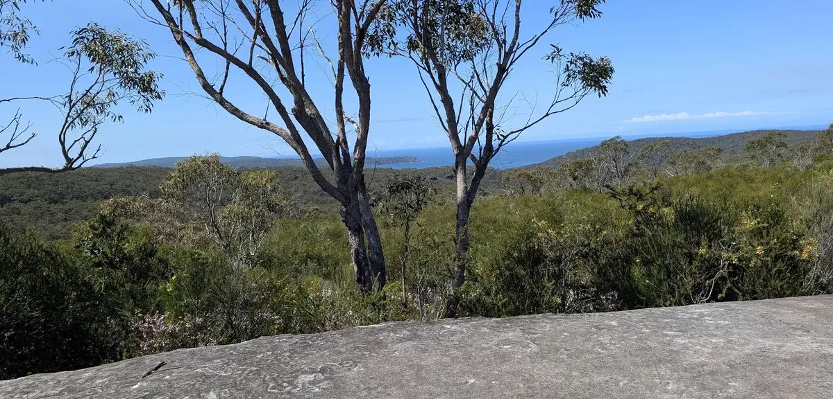Coastal panorama of Patonga Bay from the Warra Trig rock platform